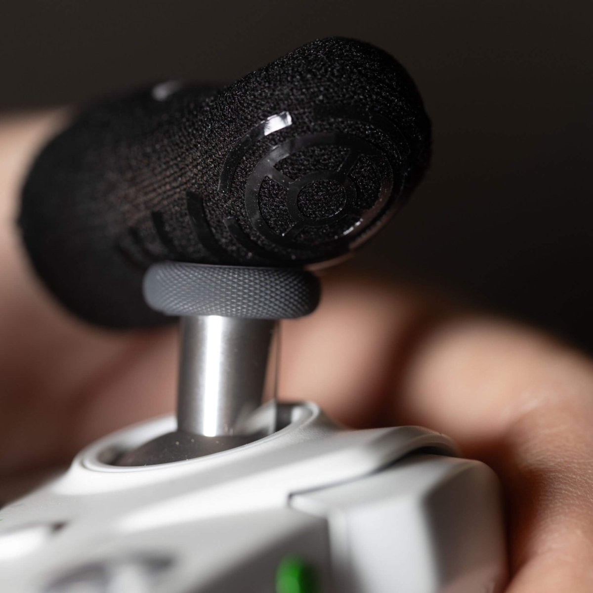 Anti-sweat carbon fiber finger sleeves for precise console controller gaming
